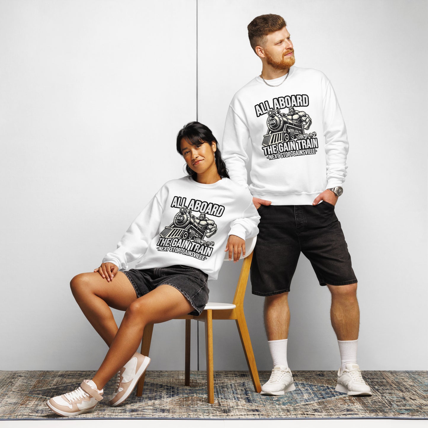 The Bougie Boiz Club Gain Train - Crew Sweatshirt showcases a gym bro flexing on a train labeled GAIN, with the phrase, All Aboard the Gain Train - Next Stop: Gainsville.