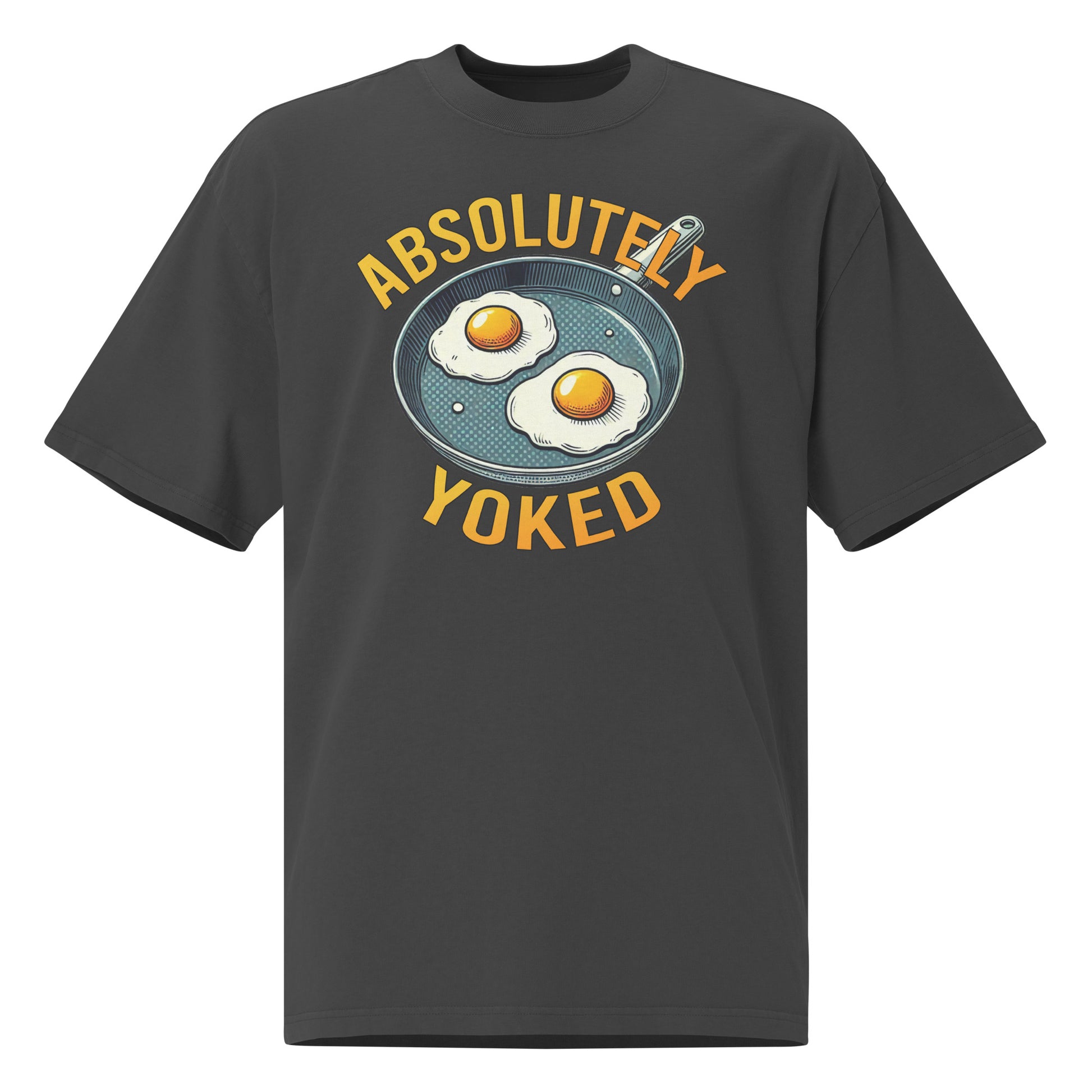 The Bougie Boiz Clubs Absolutely Yoked oversized faded dark gray T-shirt features a graphic of two sunny-side-up eggs in a pan, with bold yellow text above and below reading ABSOLUTELY YOKED, perfect for gym lifters.