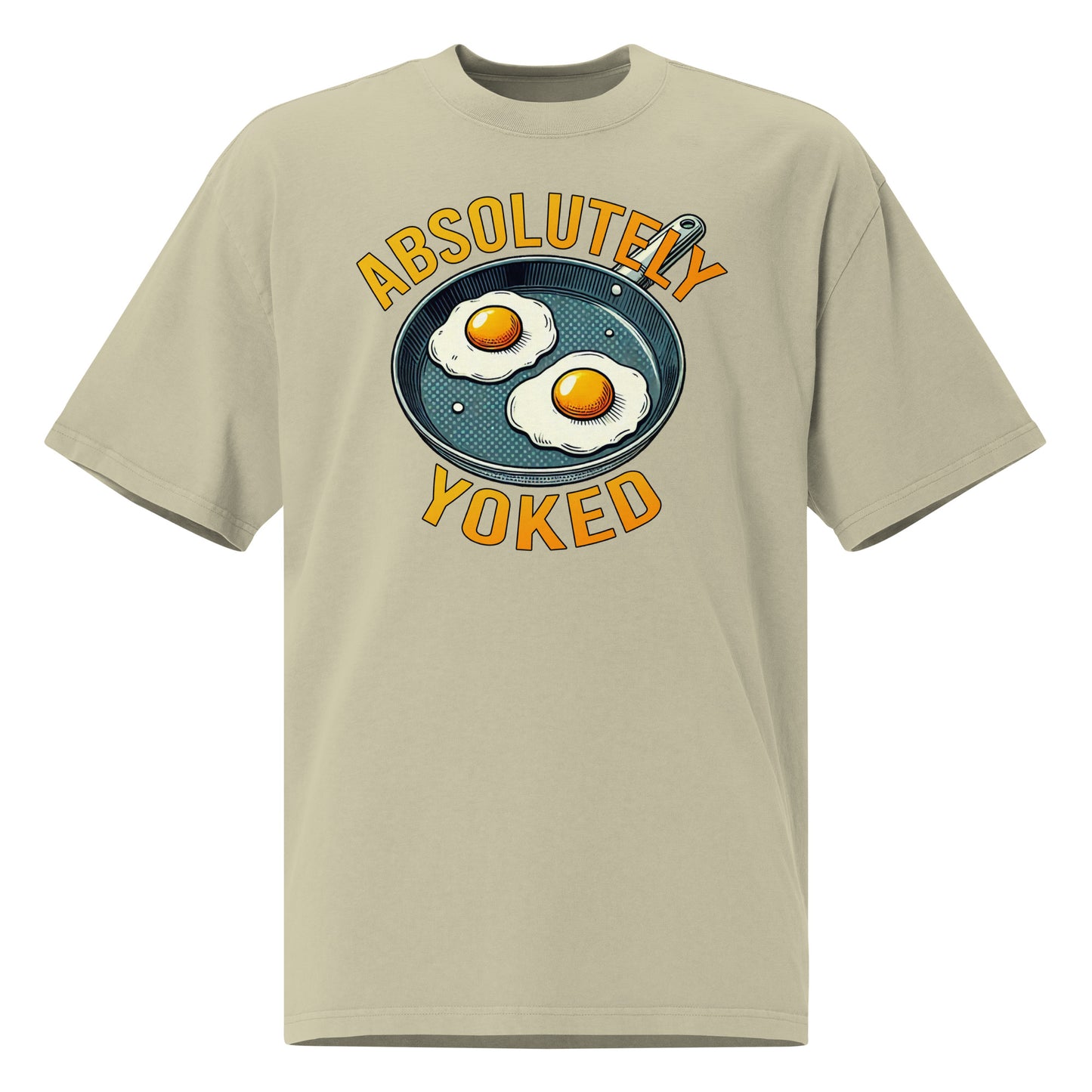 The Bougie Boiz Clubs Absolutely Yoked oversized faded dark gray T-shirt features a graphic of two sunny-side-up eggs in a pan, with bold yellow text above and below reading ABSOLUTELY YOKED, perfect for gym lifters.