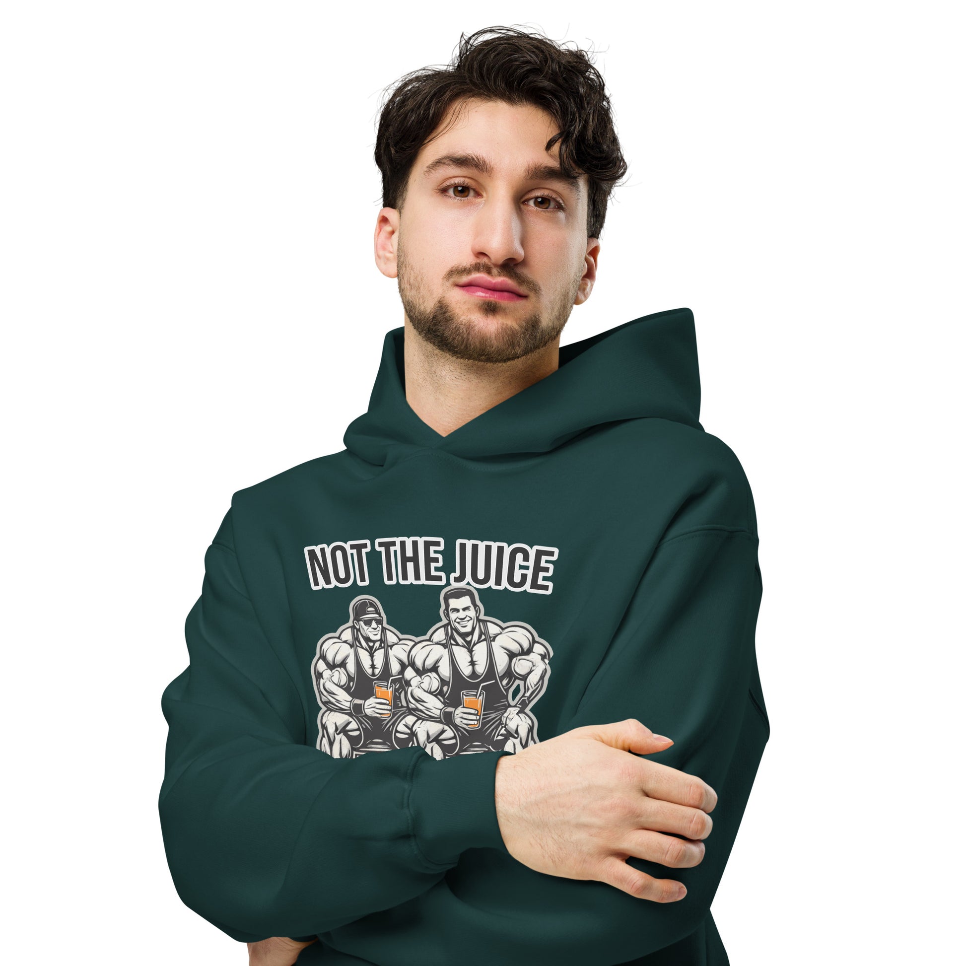 A man wearing Bougie Boiz Clubs Not The Juice - Unisex Oversized Hoodie, featuring two knights with goblets and gym humor text, complements khaki cargo pants. This relaxed fit stands out against a plain white background.